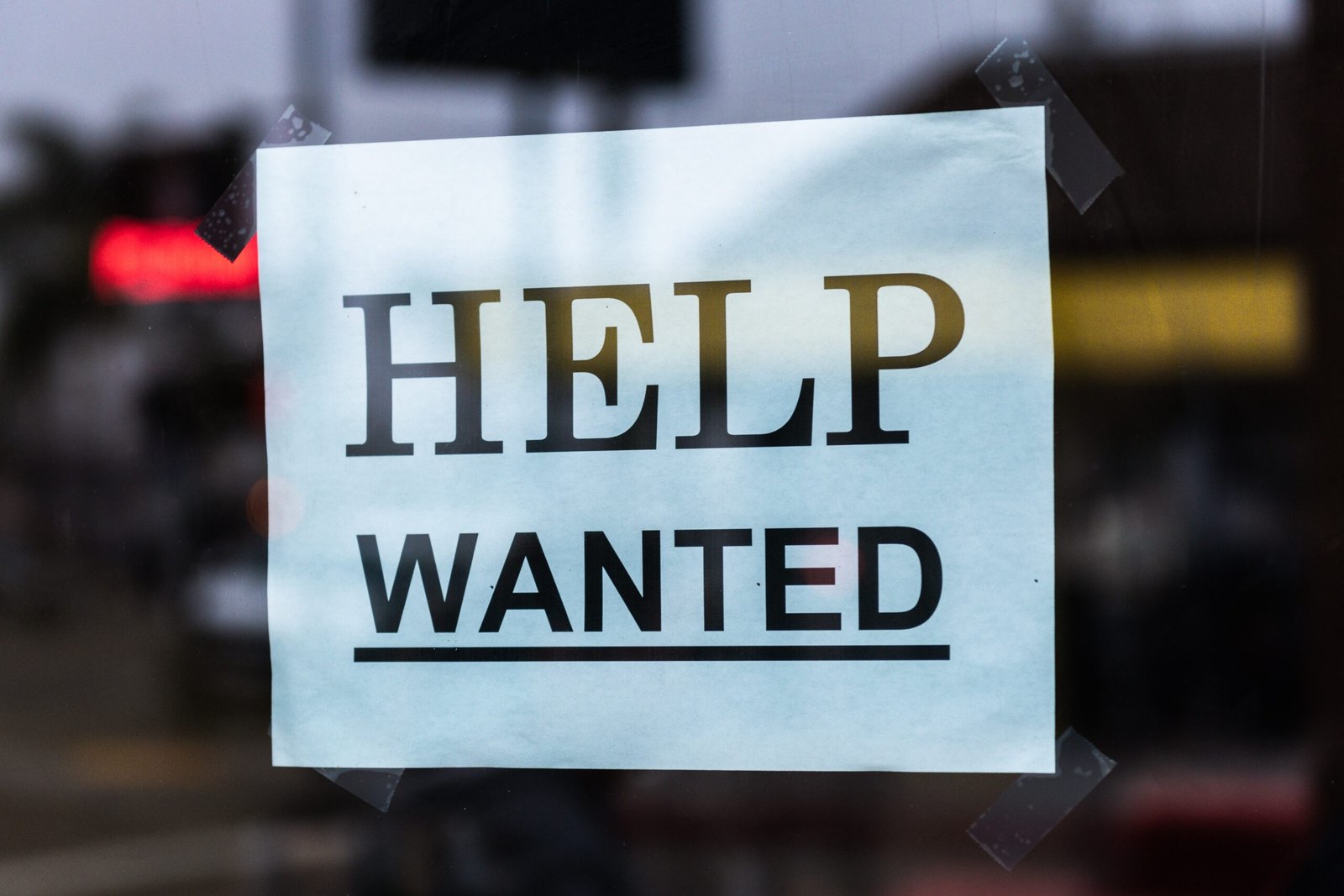 A help wanted sign representing a lack of construction workers due to a skill shortage