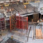 A group of skilled temporary construction workers beginning work on a facade construction who have been hand-picked and vetted by the experts at King Contract Services.