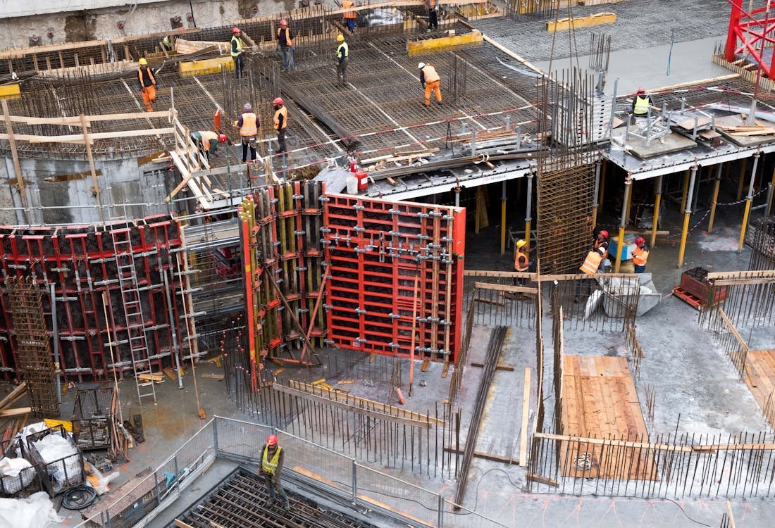 A group of skilled temporary construction workers beginning work on a facade construction who have been hand-picked and vetted by the experts at King Contract Services.